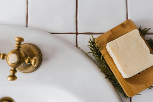Soap on soap dish next to a sink