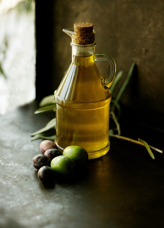 Bottle of olive oil on a table