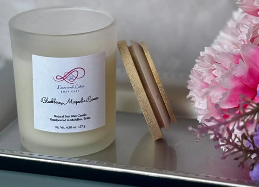 Scented Soy Wax Candles with open lid next to pink flower