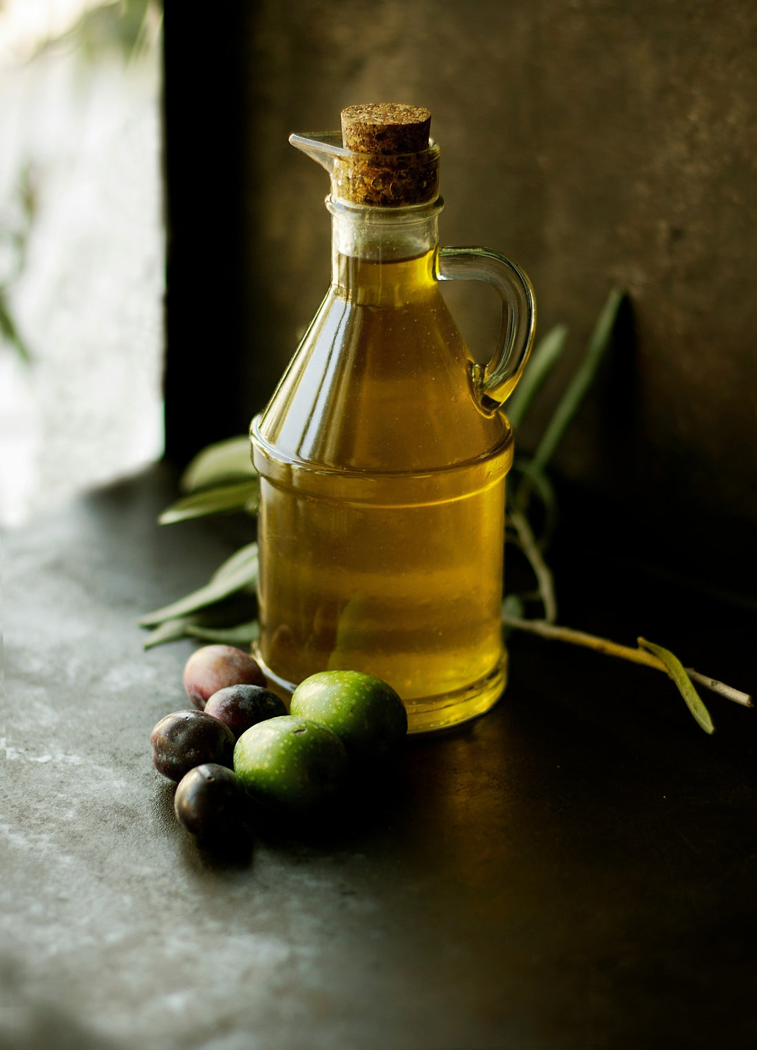 Bottle of olive oil on a table
